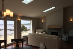 Living room lighting wired and installed with a beautiful Nova Scotia ocean view.